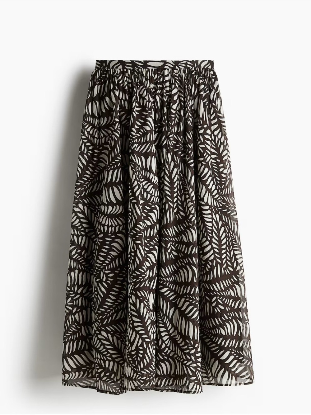 H&M brown patterned circle skirt with leaf 🍃 motif design.